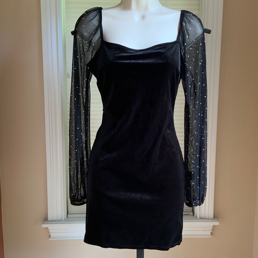 Elegant Black Dress with Sheer Sleeves